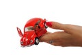 beautiful woman hand holding a red nostalgic toy car Royalty Free Stock Photo