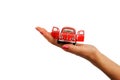 beautiful woman hand holding a red nostalgic toy car Royalty Free Stock Photo