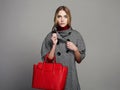 Beautiful Woman with Handbag. Beauty Fashion Girl in topcoat. winter Shopping Royalty Free Stock Photo