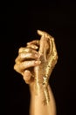 Beautiful woman hands in gold, golden hands, glitter sensual glamour luxury Royalty Free Stock Photo