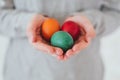 Beautiful woman hands holden colorful easter egg with perfect nails can be used as background