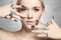 Fashion woman with jewelry and manicure Royalty Free Stock Photo