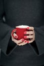 Beautiful woman hands with perfect nail polish holding coffee mug cup in her hand Royalty Free Stock Photo