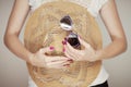 Beautiful woman hands with perfect pink nail polish holding sunhat and sunglasses, happy beach mood Royalty Free Stock Photo