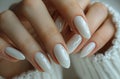 Beautiful woman hands with white manicure on isolated background, closeup of beautiful fingers and nail art Royalty Free Stock Photo