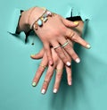 Beautiful woman hands with yellow pink white pattern nail polish Royalty Free Stock Photo