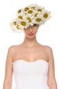 Beautiful woman in hat of daisies and white dress Royalty Free Stock Photo