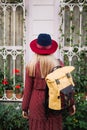 Beautiful woman in hat and dress walking in Istanbul street, Turkey