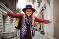 Beautiful woman in hat and dress walking in Istanbul street, Turkey