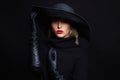 Beautiful woman in hat and leather gloves.halloween witch Royalty Free Stock Photo