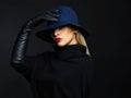 Beautiful woman in hat and leather gloves. Retro fashion girl Royalty Free Stock Photo