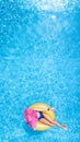 Beautiful woman in hat in swimming pool aerial top view from above, young girl in bikini relaxes swims on inflatable ring donut Royalty Free Stock Photo