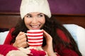 Beautiful woman having hot drink