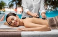 beautiful woman having hot stone massage at spa Royalty Free Stock Photo