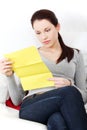 Beautiful woman having a look at the documents. Royalty Free Stock Photo