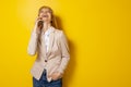 Woman speaking on the phone and laughing Royalty Free Stock Photo