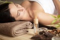 Beautiful woman having relaxing in spa massage salon. Royalty Free Stock Photo