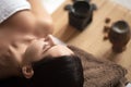 Beautiful woman having relaxing in spa massage salon. Royalty Free Stock Photo