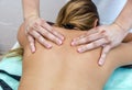 Beautiful woman having a wellness back massage Royalty Free Stock Photo