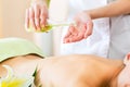 Woman having wellness back massage in spa Royalty Free Stock Photo