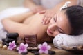 Beautiful woman having a wellness back massage at spa salon Royalty Free Stock Photo