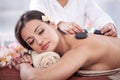 Beautiful woman having a wellness back massage at spa salon Royalty Free Stock Photo