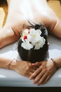 Beautiful woman having a wellness back massage. Royalty Free Stock Photo