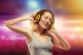 Beautiful woman with headphones listening music