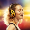 Beautiful woman with headphones listening music