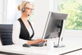 Beautiful woman in headset working in call center Royalty Free Stock Photo