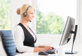 Beautiful woman in headset working in call center Royalty Free Stock Photo