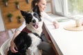 Beautiful woman and her best friend a happy dog Royalty Free Stock Photo