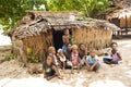 Beautiful woman with children in front of straw hut, Nemba, Utupua, Solomon Islands, South Pacific Islands