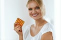 Beautiful Woman Holding Birth Control Pills, Oral Contraceptive