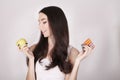 Young Asian female doctor with pills and apple Royalty Free Stock Photo