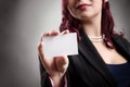 Beautiful woman holding blank business card Royalty Free Stock Photo