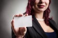 Beautiful woman holding blank business card Royalty Free Stock Photo