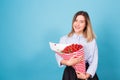 Beautiful woman holding bouquet made of strawberry Royalty Free Stock Photo