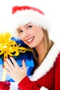 Beautiful woman holding a Christmas present Royalty Free Stock Photo