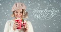 Beautiful woman holding cup of hot coffee. Happy New Year Royalty Free Stock Photo