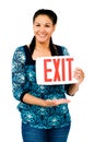 Beautiful woman holding exit sign Royalty Free Stock Photo