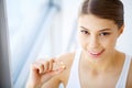 Beautiful Woman Holding Fish Oil Pill In Hand. Healthy Nutrition Royalty Free Stock Photo