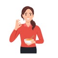 Beautiful woman holding Janpanese pork noodle ramen bowl with ok sign