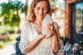 Beautiful woman holding the natural protection crystal. Royalty Free Stock Photo