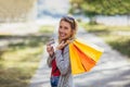 Beautiful woman holding shopping bags and a credit card Royalty Free Stock Photo