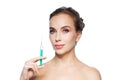 Beautiful woman holding syringe with injection Royalty Free Stock Photo