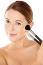 Beautiful woman holding two cosmetic brushes Royalty Free Stock Photo