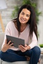 beautiful woman at home websurfing on internet Royalty Free Stock Photo