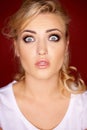 Beautiful woman with a horrified expression Royalty Free Stock Photo