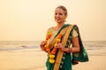 Beautiful woman indian wearing green fashion sari, bindis and paint. Close up of beauty indian woman with perfect makeup